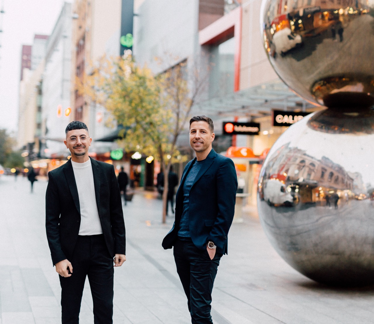 Two men walking in Adelaide CBD, representing employer-sponsored migration